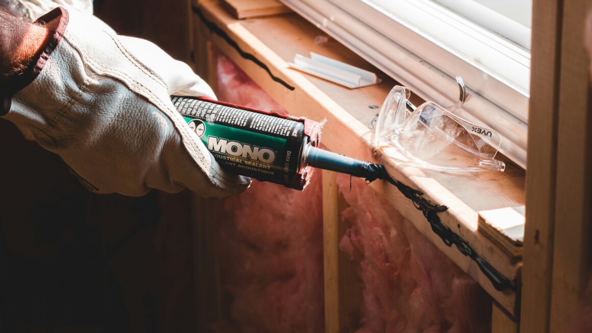 caulking a windowsill