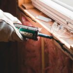 caulking a windowsill